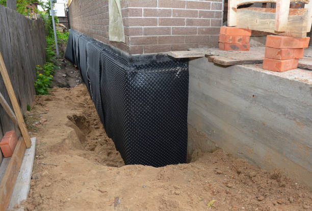 SJ Waterproofing Pros technician performing targeted Sump Pump Installation assessment in Centerville, GA